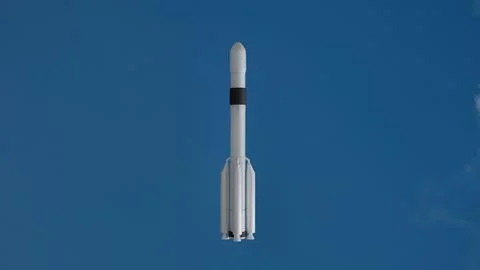 A 3D model of a space rocket against a blue sky as a rocket launch theme for  Foto stock