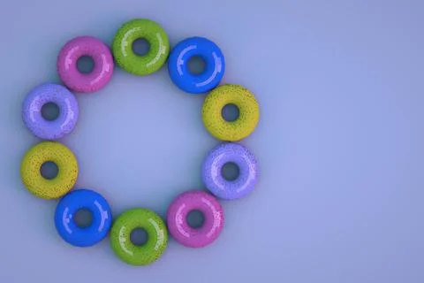 3D models of different, multi-colored glazed donuts on a blue isolated Stock Photos
