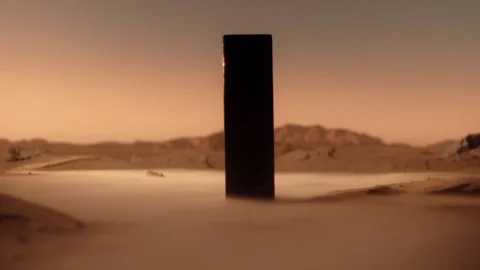A 3d monolith in a desert on another planet Stock Footage 274645404