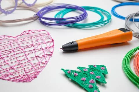 3d Pen. Printing with Colored Plastic Wire Filament. Child making a Christm.. Stock Photos