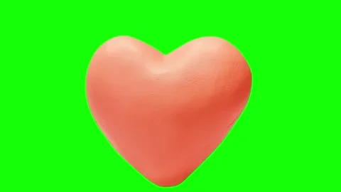 3d pink heart shapes floating and pulsing against a vibrant chroma key green Stock Footage 338173612