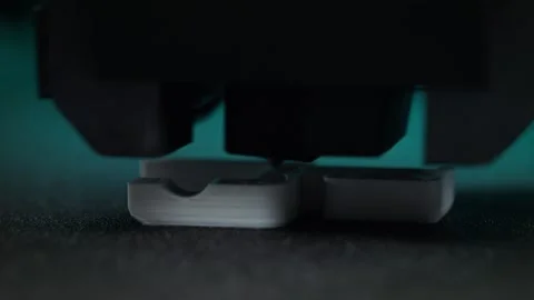 3D Print Created from White Thermoplastic Filament Extruded from the Nozzle Stock Footage 286243904