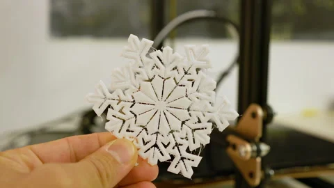 3D printed plastic snowflake close up Stock Footage 121004597