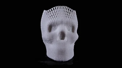 3D printed skull bone wire frame animation in camera effect against black BG Stock Footage