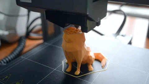 3D printer. 3d printer printing close-up. Molten plastic flowing out of extruder Stock Footage 237373036