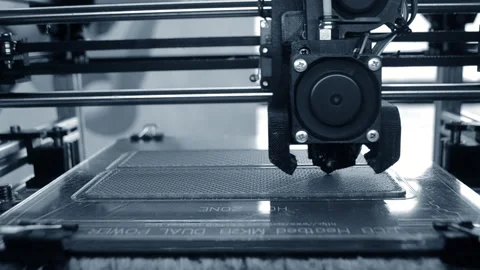 3D printer 3D printer printing object close-up 3D printer printing model blue Stock Footage 331182361