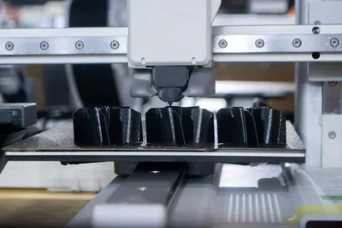 3D printer 3D printer printing object close-up printing model black color Stock Photos
