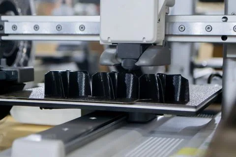 3D printer 3D printer printing object close-up printing model black color Stock Photos