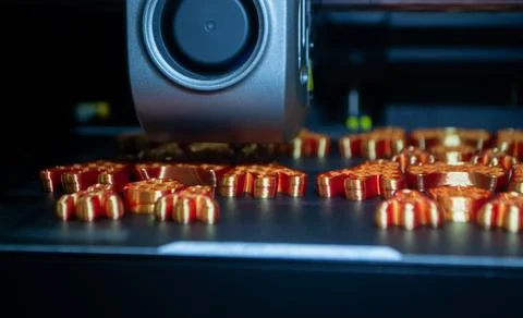 3D printer 3D printer printing object close-up printing model orange color Stock Photos