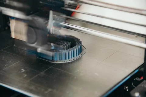 3D printer in action building a plastic component Stock Photos
