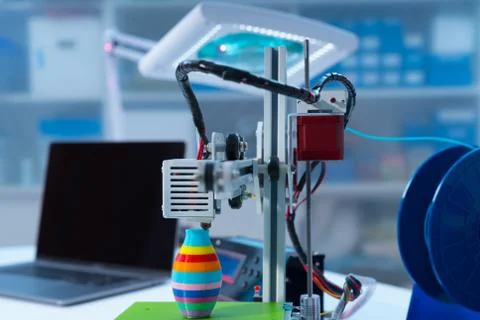 3D printer and computer on the table Stock Photos