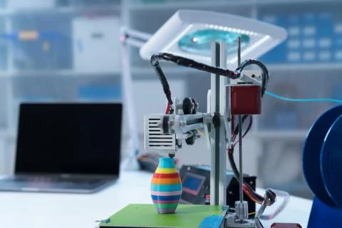 3D printer and computer on the table Stock Photos