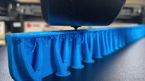 3D Printer Building Tall Blue Technical Component Upright Vídeos de archivo 345586188