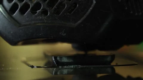 3D printer close up printing black block Stock Footage 276396601