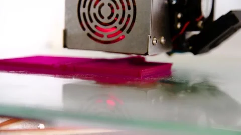 3D printer close-up printing the product. The printer elements are moving Видео 225322992
