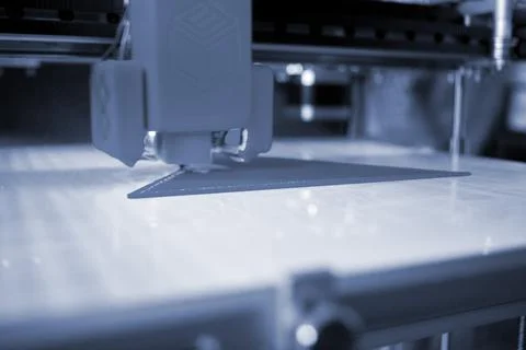 3D printer close up Working 3D printer process printing object molten plastic Stock Photos