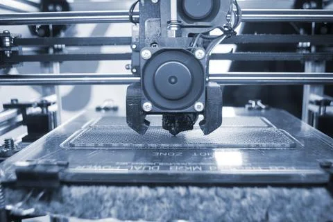 3D printer close up Working 3D printer process printing object molten plastic Stock Photos