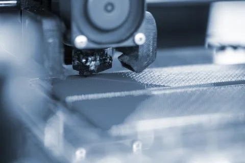 3D printer close up Working 3D printer process printing object molten plastic Stock Photos