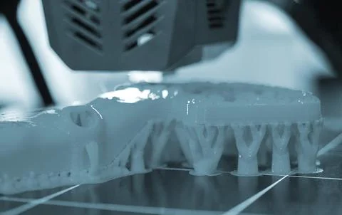 3D printer close up Working 3D printer process printing object molten plastic Stock Photos