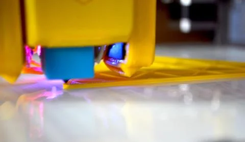 3D printer close up Working 3D printer process printing object molten plastic Stock Photos