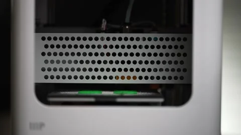 3D the printer creates an eiffel tower object with molten plastic close-up Stock Footage 150720536