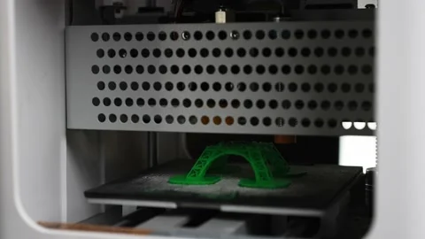 3D the printer creates an eiffel tower object with molten plastic close-up Stock Footage 150720820