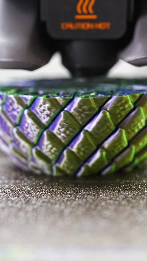3D printer creates green and purple design on surface Stock-Footage 344420594