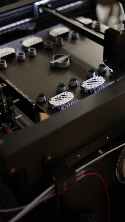 3D printer creates object vertical video Stock Footage 286050779
