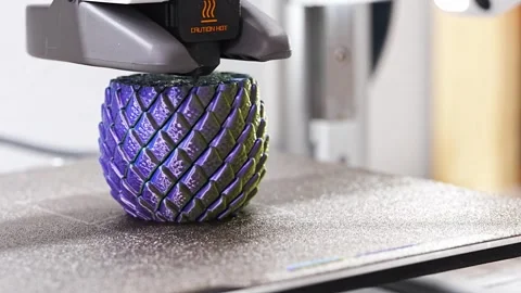 3D printer creates a unique design in a workshop setting Stock-Footage 344421260