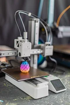 3D printer creating colorful gradient object, detailed precision printing p.. Stock-Fotos