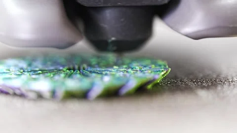 3D printer creating a detailed design on a flat surface Stock-Footage 344420309