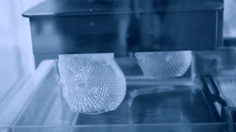 3d printer creating shape by UV polymerization. Stock Footage 99816831