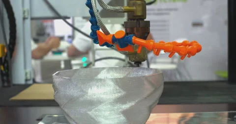 3d printer creating a translucent plastic bowl Stock Footage 315025986
