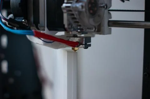 3d printer extruder close-up with blurred background Stock Photos