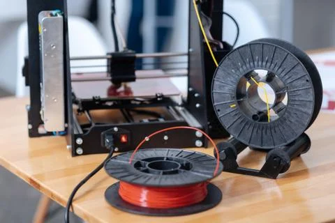 3D printer filament lying on the table Stock Photos