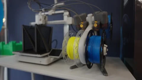 3D Printer Filament Spool in Motion, Medium Shot Pan, Technology Concept Stock Footage 320167403