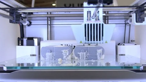 3d printer iGo 3d Ultimaker printing close up process on exhibition Cebit 2017 Stock Footage 76873224