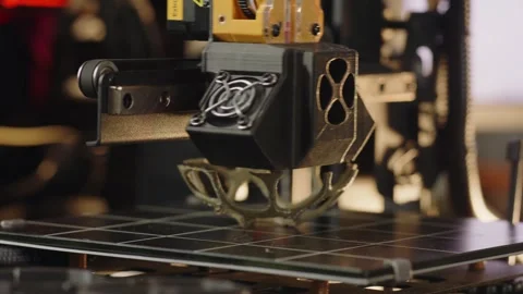 A 3d printer machine is making volume geometric figure. The working process Stock Footage 257800011