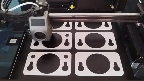 3D printer machining several parts in series Stock Footage 285178075