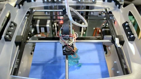 3D printer makes a sketch of a figure, a top view Stock Footage 67610415