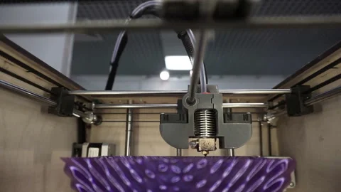 The 3D printer makes a vase-shaped figure. 3D printer in action. 3D printer clos 動画素材 120687799