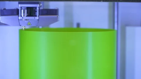 3D printer making a green objects  Stock Footage 88545510
