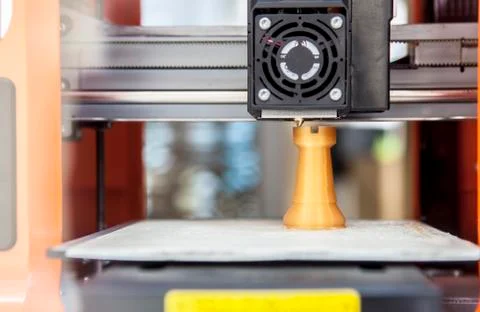 3d printer making plastic chess piece Stock Photos
