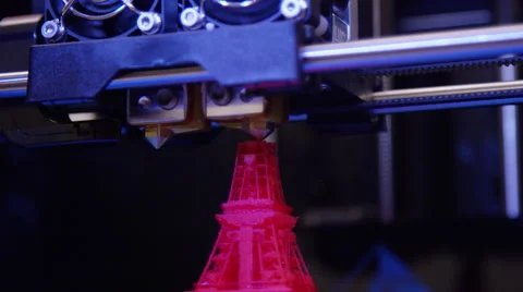 3D printer making statue of Eiffel Tower - high tech close up Stock Footage 64865357