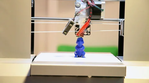 3D printer making a toy, child hand touches model, industrial robot in action Stock Footage 38293848