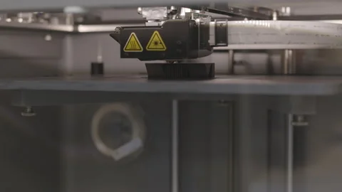 3D printer mechanical print head at work printing engineering components Stock Footage 139604960