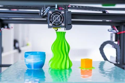 3d printer mechanism working during the processes. Modern 3D printing.. Stock Photos