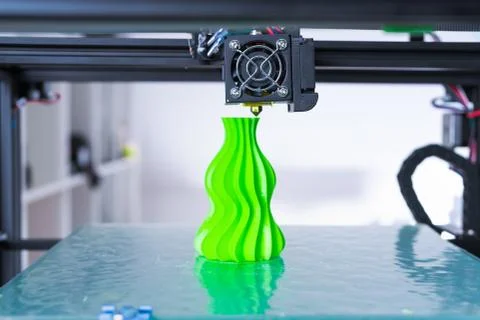 3d printer mechanism working during the processes. Modern 3D printing.. Stock Photos