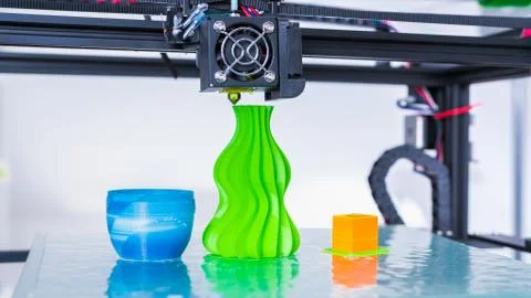 3d printer mechanism working during the processes. Modern 3D printing.. Stock Photos
