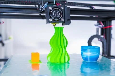 3d printer mechanism working during the processes. Modern 3D printing.. Stock Photos